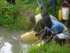 Children Using a Dirty Pond